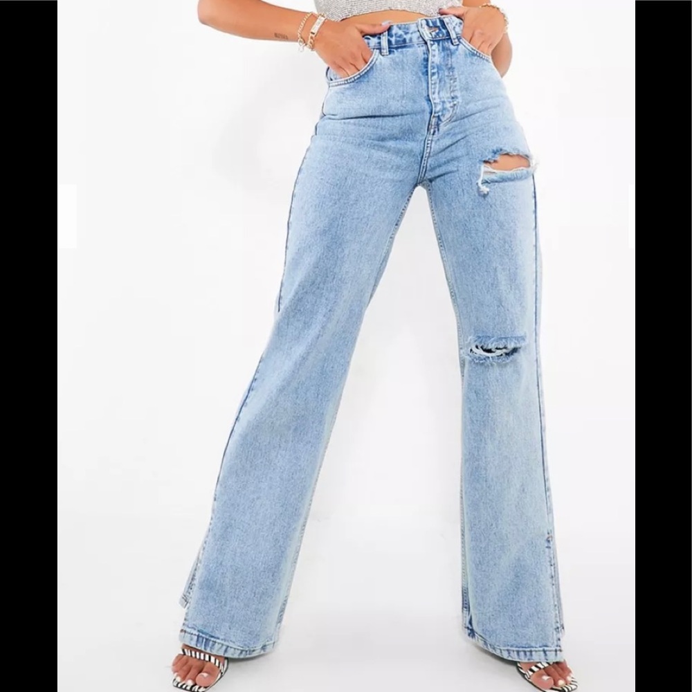ACID WASH RIP SPLIT HEM JEANS